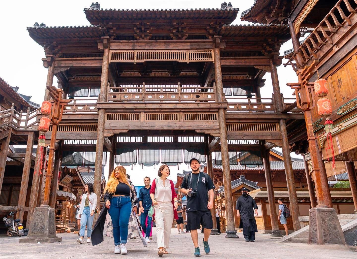 Visitors at Hengdian World Studios attend cross-cultural film exchange
