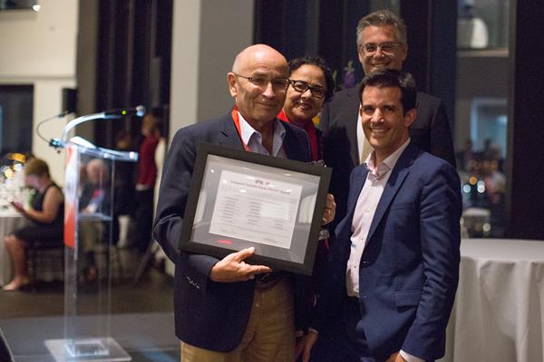 Professor Avigdor Scherz from the Weizman Institute (front-left) and Dr. Emmanuel Coeytaux from Steba Biotech (front-right) receiving the Inaugural Tayyaba Hasan IMPACT Award IPA Past-President, Dr. Tayyaba Hassan (back-left), and IPA President, Dr. Luis Arnaut (back-right).