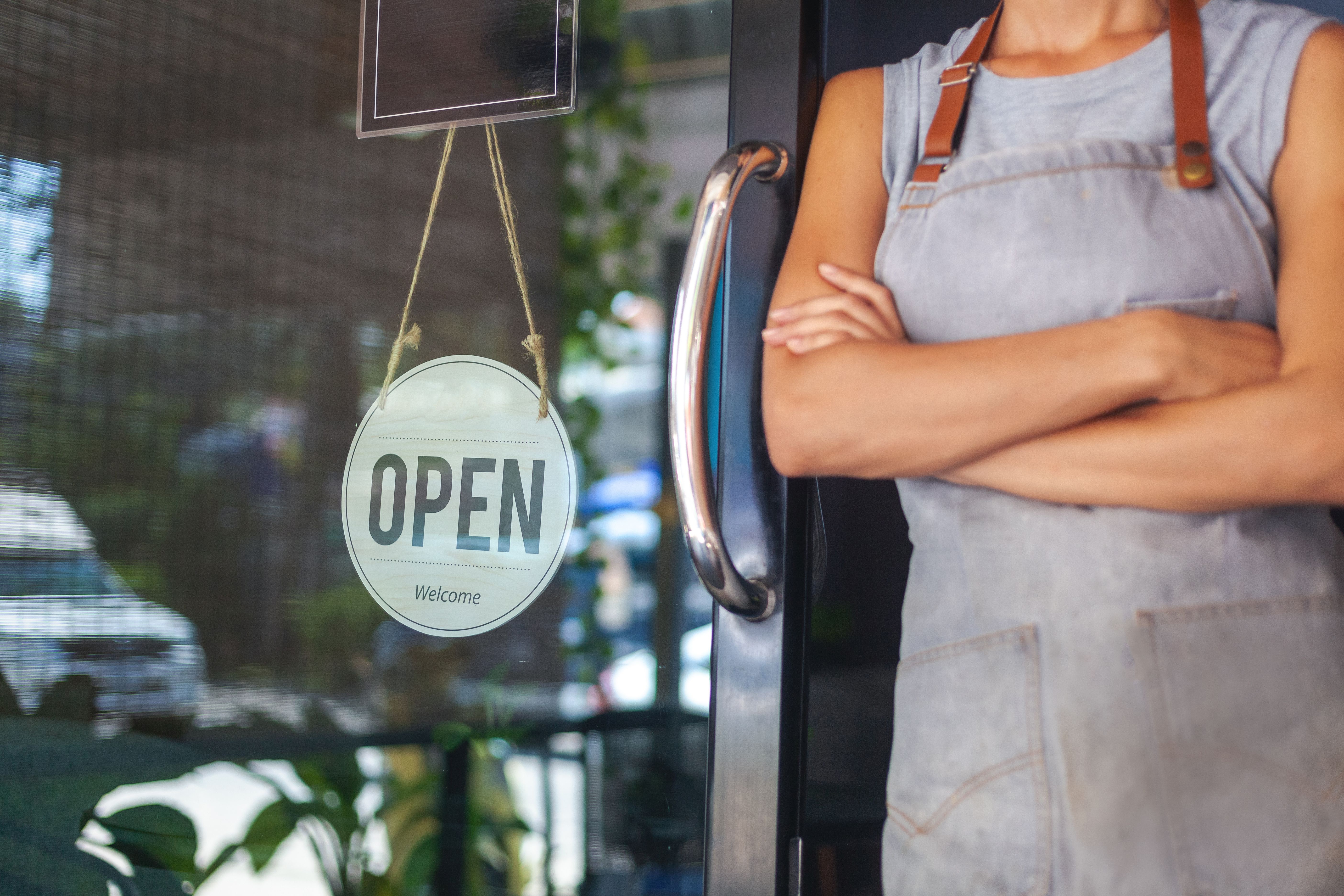 Small Business Owner in Front of Store