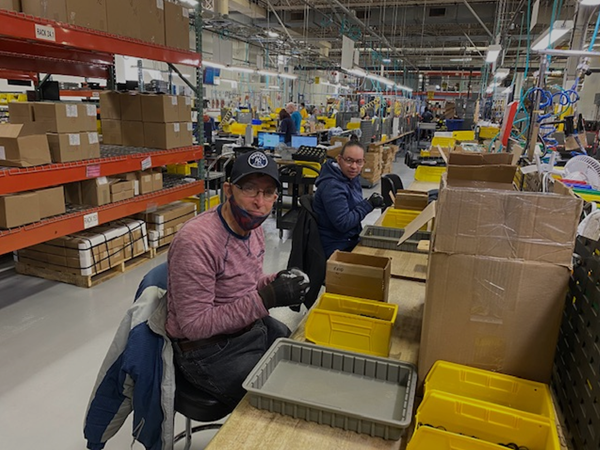 Easterseals members hard at work at the Eemax facility