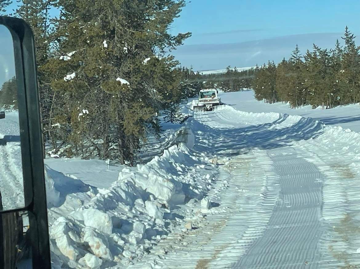 A photo of snow clearing efforts working on a path to gravel pit at Key Lake South Project