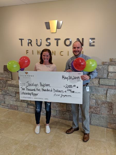 TruStone Financial presents Jocelyn Nyblom with scholarship check