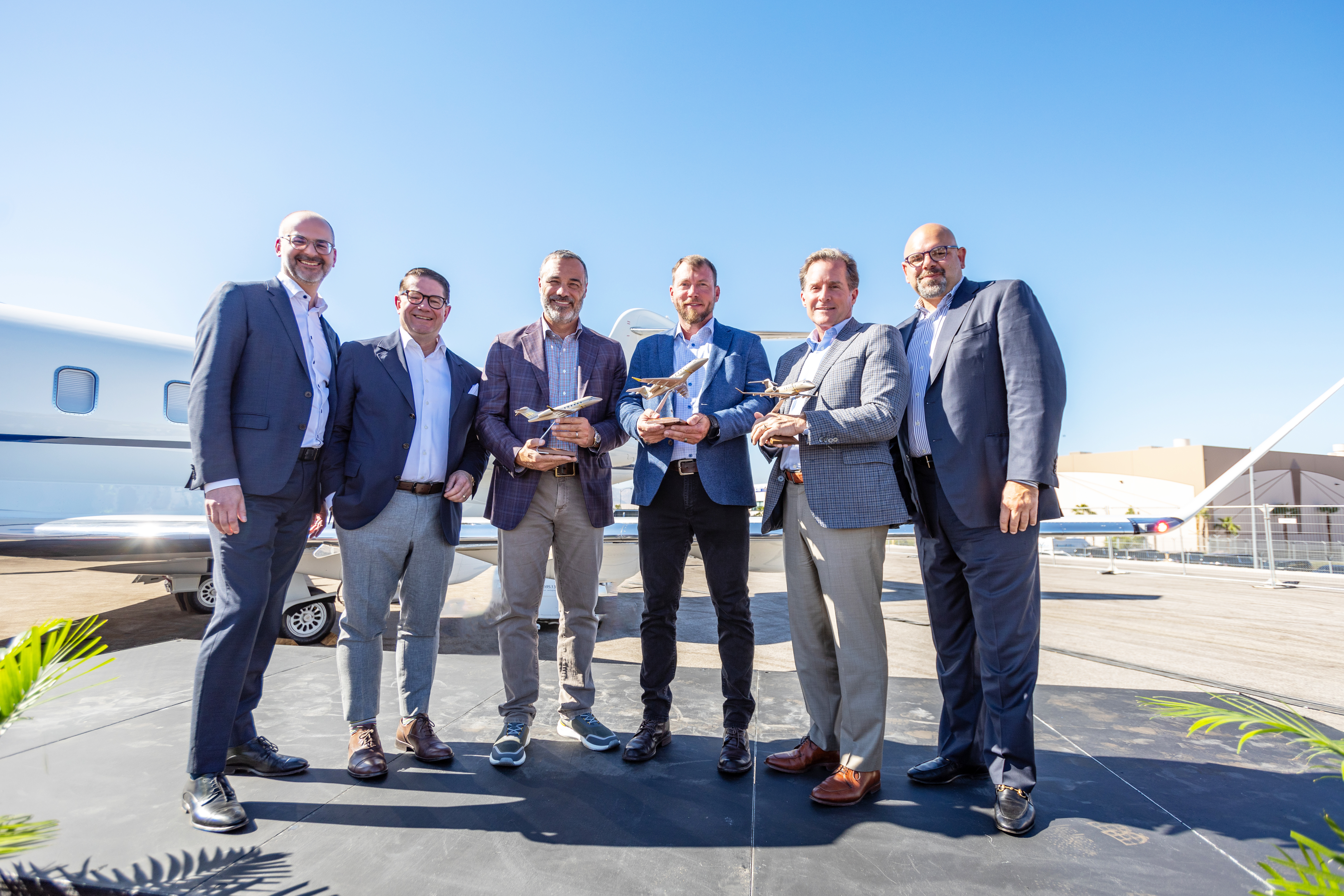 From left to right: Jean-Christophe Gallagher, Executive Vice President, Aircraft Sales & Bombardier Defense, Éric Martel, President and CEO at Bombardier, David Turner, Co-owned and Director of Operations at AB Jets, Andrew Bettis, founder and co-owner of AB Jets, Mark H. George, Chairman at IMC, and Frank Vento, Vice President, Sales - US.
