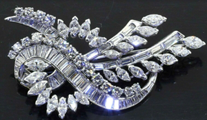 Heavy Platinum 6.25CTW VS1/F diamond cluster floral ribbon brooch. Sold for $4,739 at last week’s SFLMaven Famous Thursday Night Auction