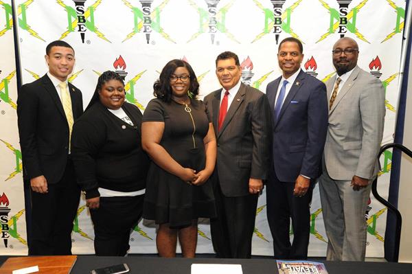 From left to right: Julius Page, National Secretary; Alanna Tremble-Winfrey, Annual Convention Planning Committee Chair; Niasia Williams, National Chair; Larry Alexander, President & CEO of the Detroit Metro Convention & Visitors Bureau; Karl Reid, Executive Director; Anthony B. Murphy, National Professionals Chair
