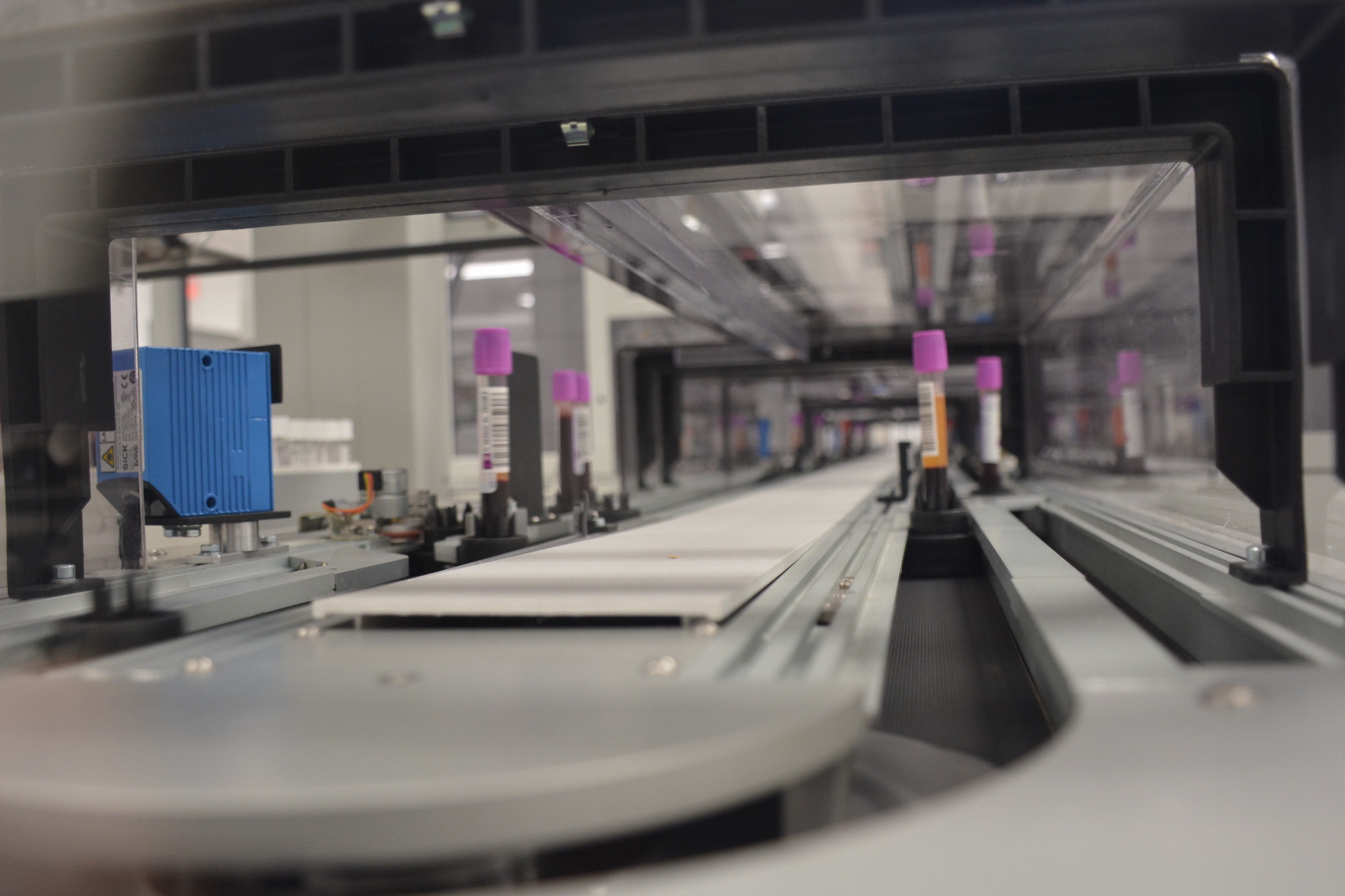 Detail of the Abbott Accelerator a3600 system, showing the pathway for test tubes through the automated blood testing system. The automation track recently went into production at the QualTex facility in San Antonio, Texas.