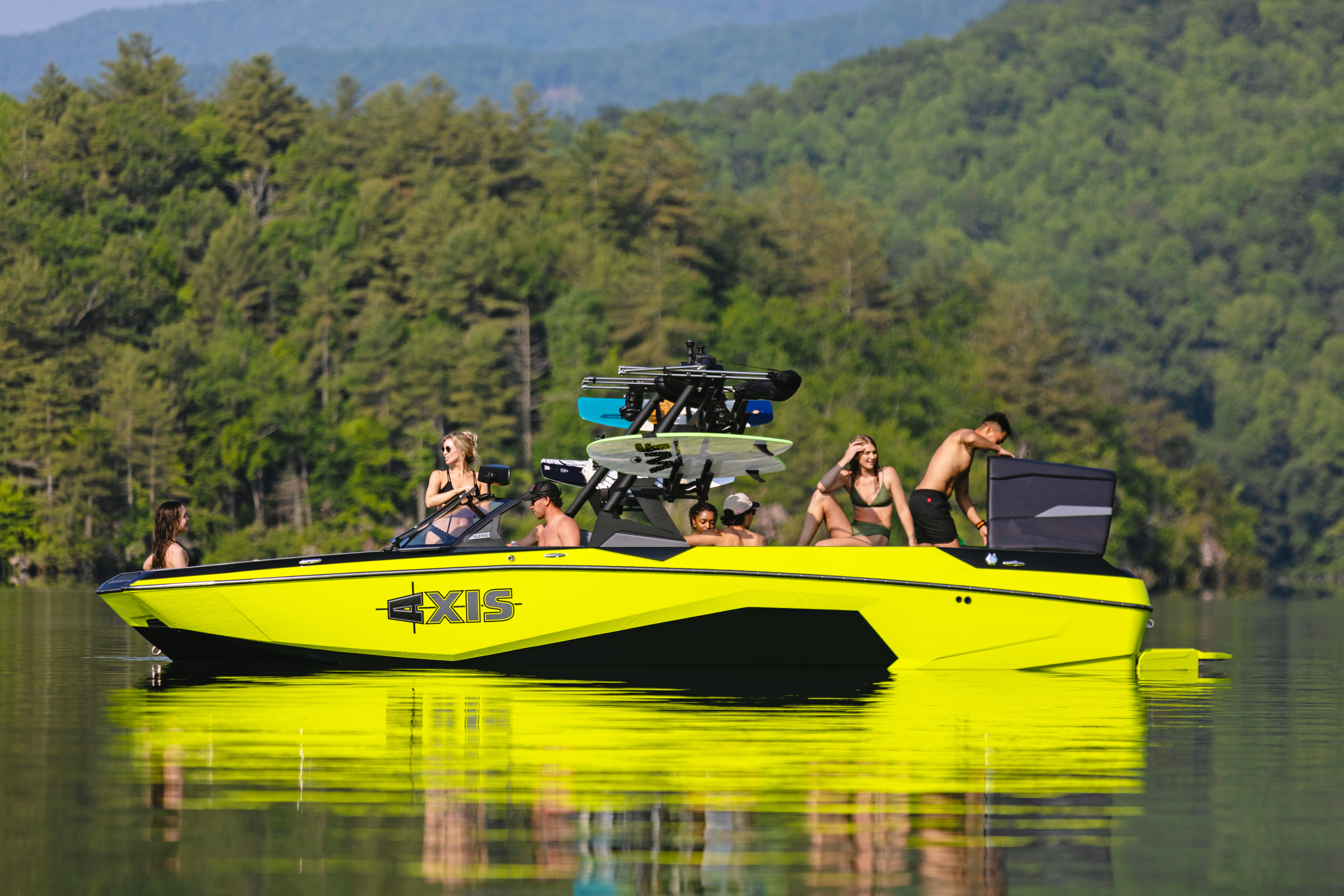 Completely new from bow to stern, the Axis A245 is without question the crown jewel of the Axis line-up. Highlighted by an all-new, state-of-the-art hull profile for enhanced on-water performance and an all-new aggressive look, this 18-seat pickle-fork wakeboat comes with easy-to-access, deep storage, and plenty of seating for all your friends and family.