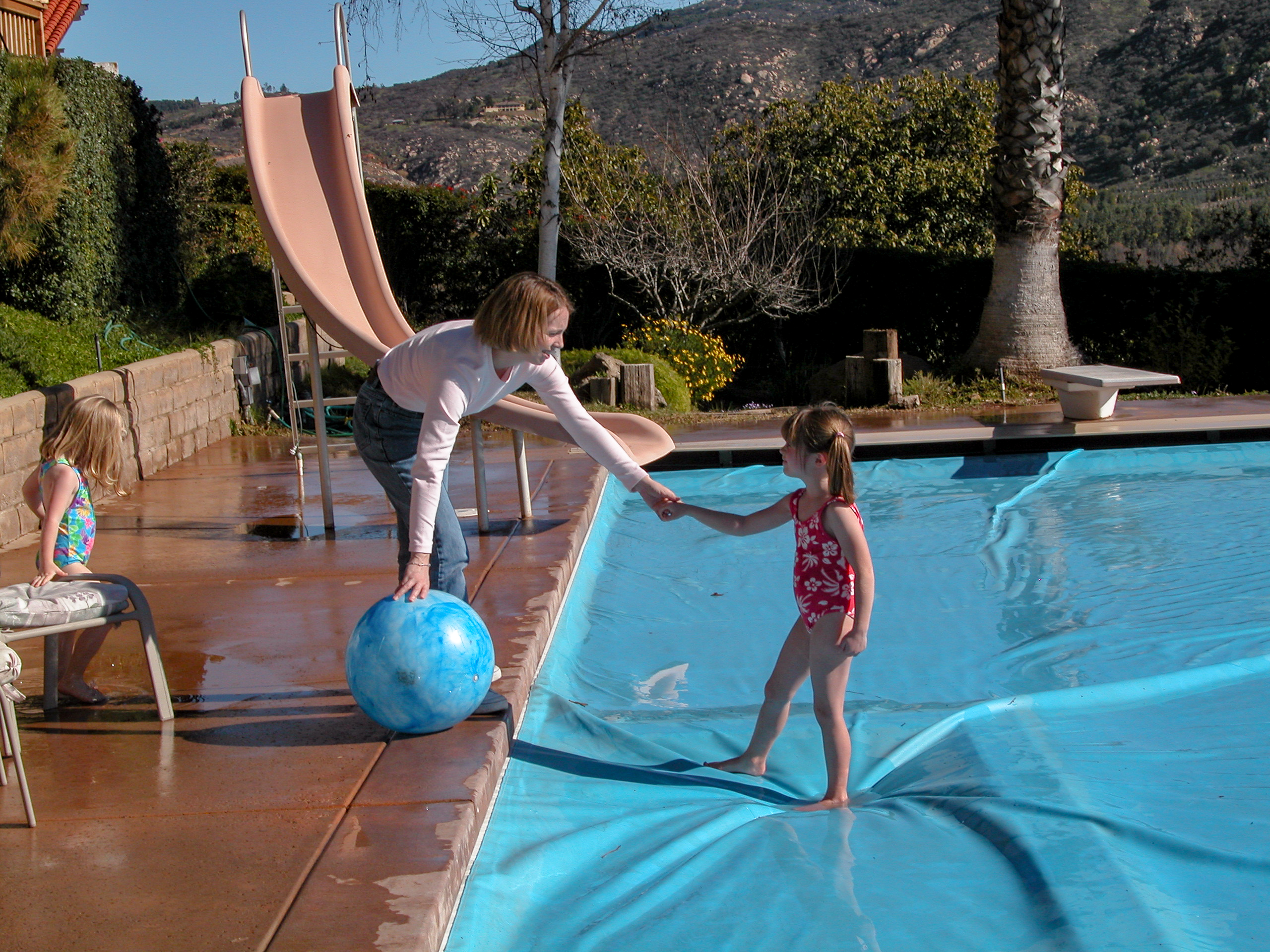 Child playing on autocover
