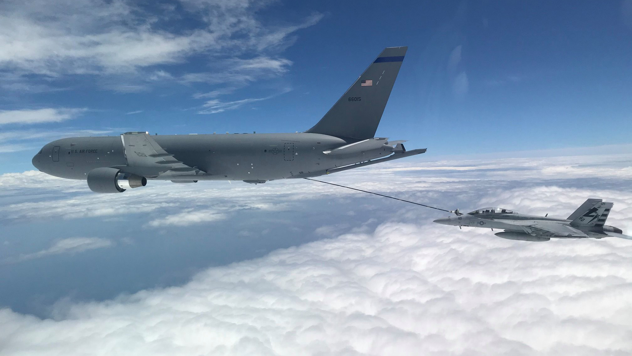 New Hampshire-based KC-46A aircrew refuel a U.S. Navy F/A-18F Super Hornet off the coast of Maryland on July 1, 2020. Photo: U.S. Navy