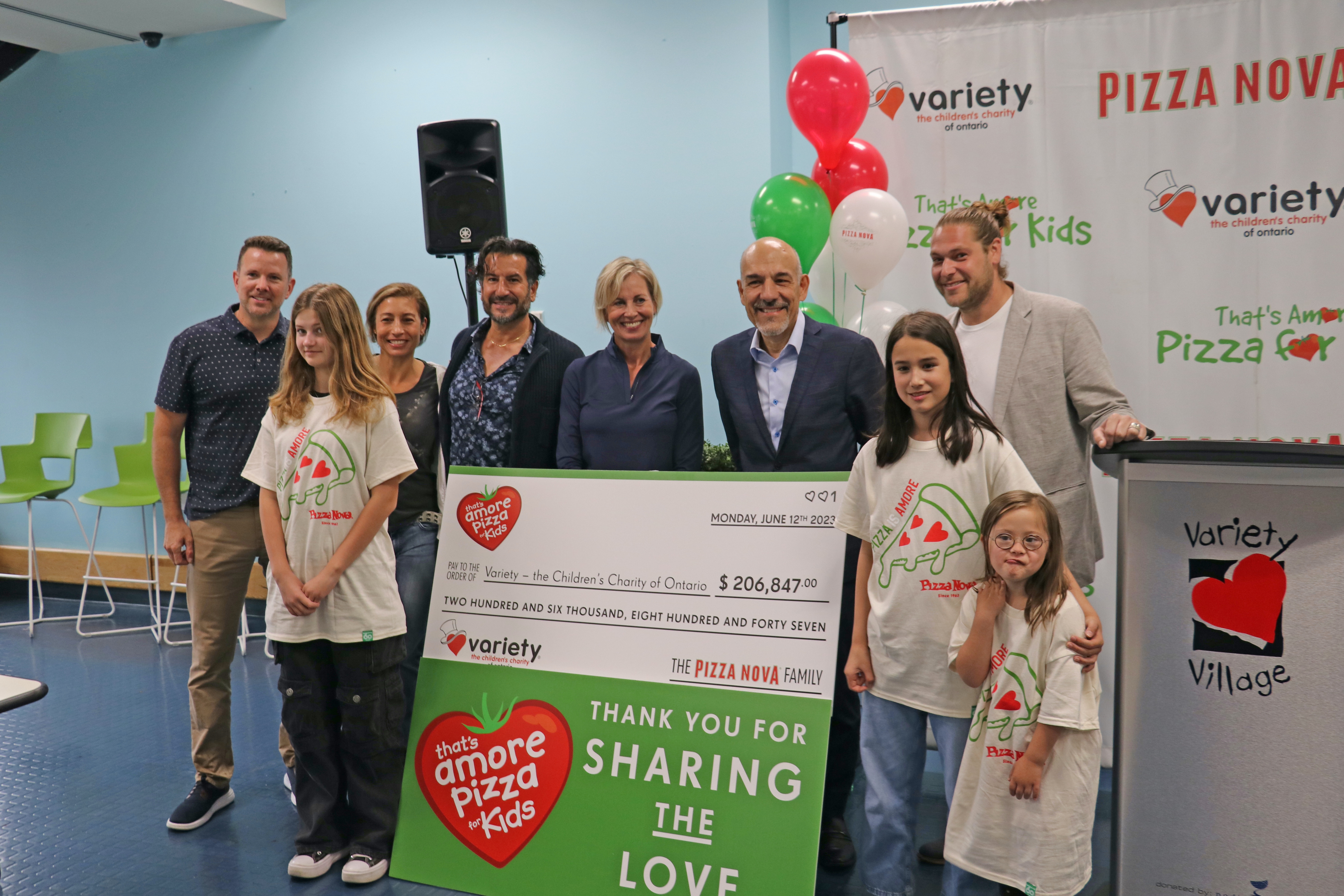 Domenic Primucci, president of Pizza Nova, presents a cheque for $206,847 to Karen Stintz, CEO of Variety The Children’s Charity of Ontario, at Variety Village, June 12, as a result of the 2023 “That’s Amore Pizza for Kids” fundraiser. 