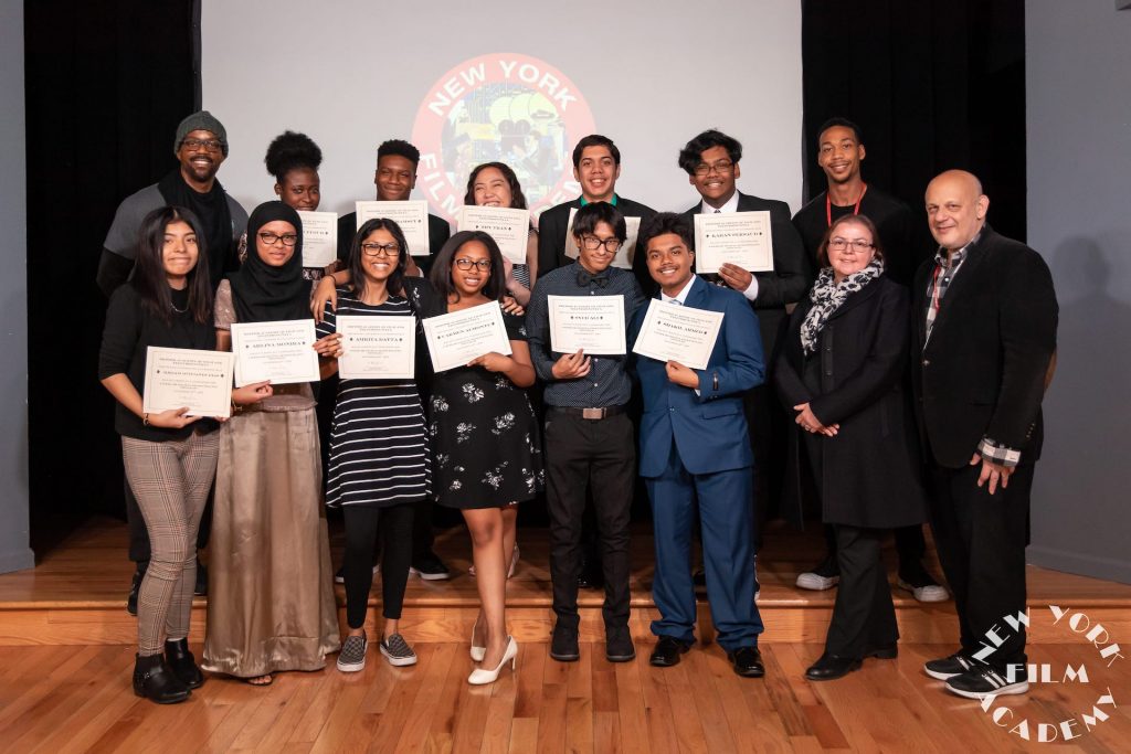 Participating students from DeWitt Clinton High School joined by Neal Weisman.