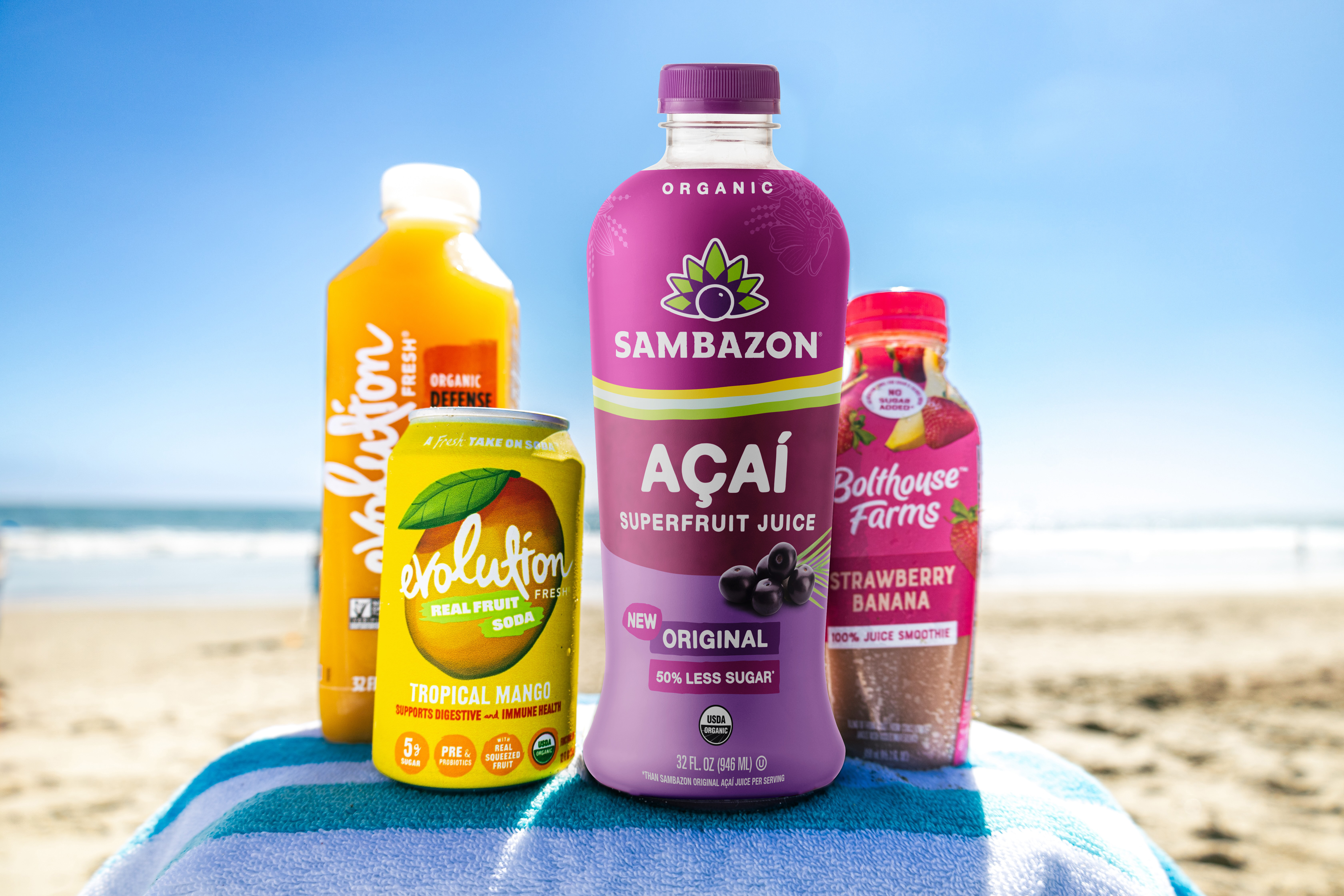 A selection of Generous Brands beverage products is featured including the portfolio's first Integrated Partnership brand, SAMBAZON, positioned alongside Bolthouse Farms and Evolution Fresh.  