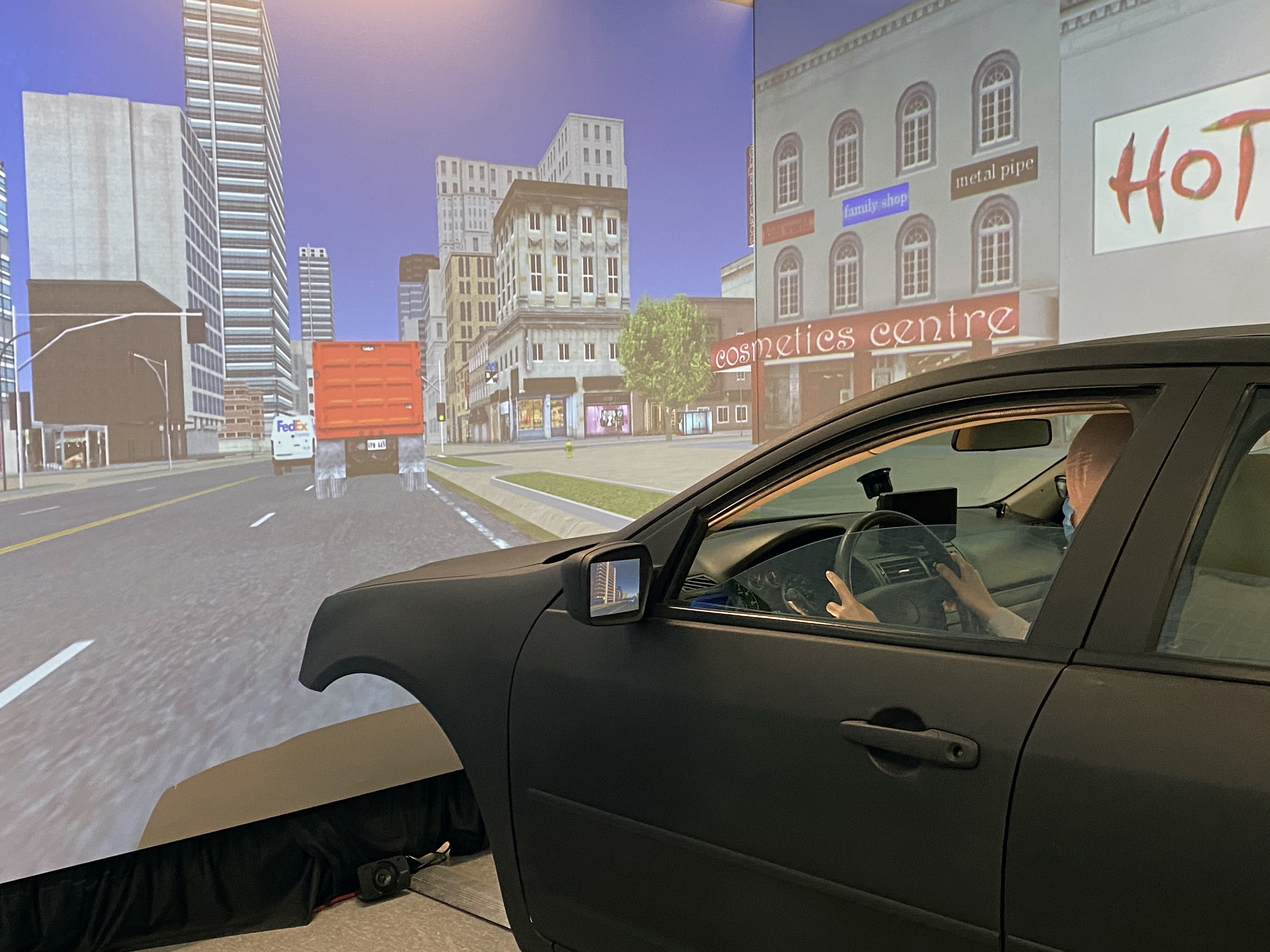 LSU Civil Engineering Assistant Professor Hany Hassan conducts research in the college's driving simulator as part of his study into senior citizens' driving behavior in various traffic and environmental conditions.