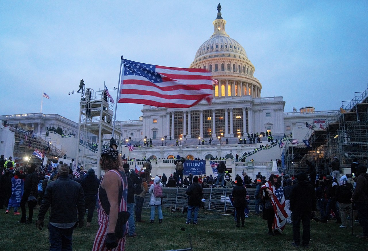 PHOTO CREDIT: Tyler Merbler, CC BY 2.0, via Wikimedia Commons - The storming of the US Capitol in Washington, DC on January 6th, 2021