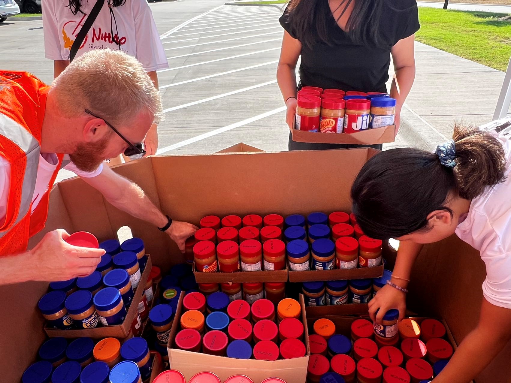 NiHao Food Bank Initiative collects peanut butter for NTFB