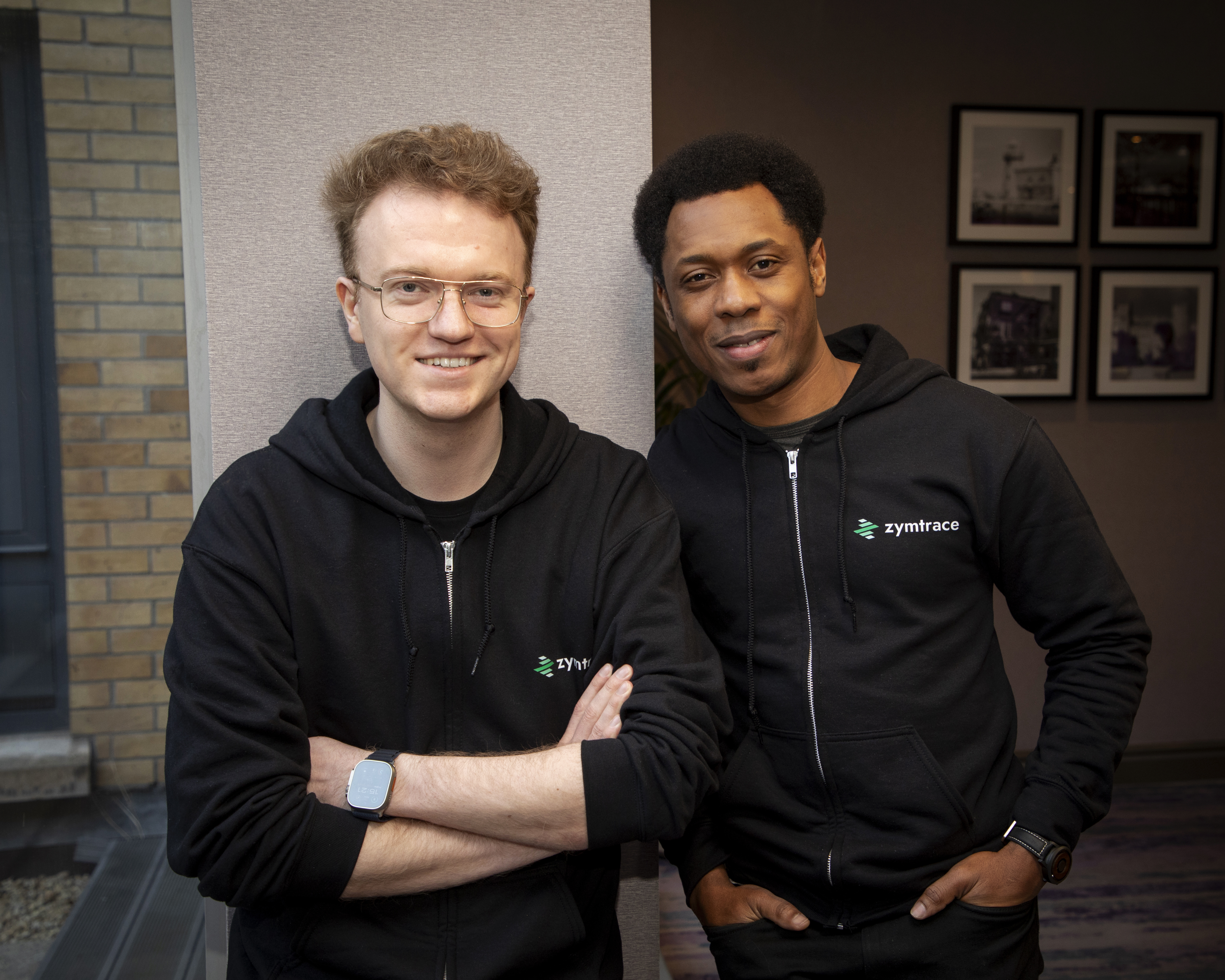 Israel Ogbole, CEO and Co-Founder of Zymtrace, standing with Joel Höner, CTO and Co-Founder of Zymtrace.