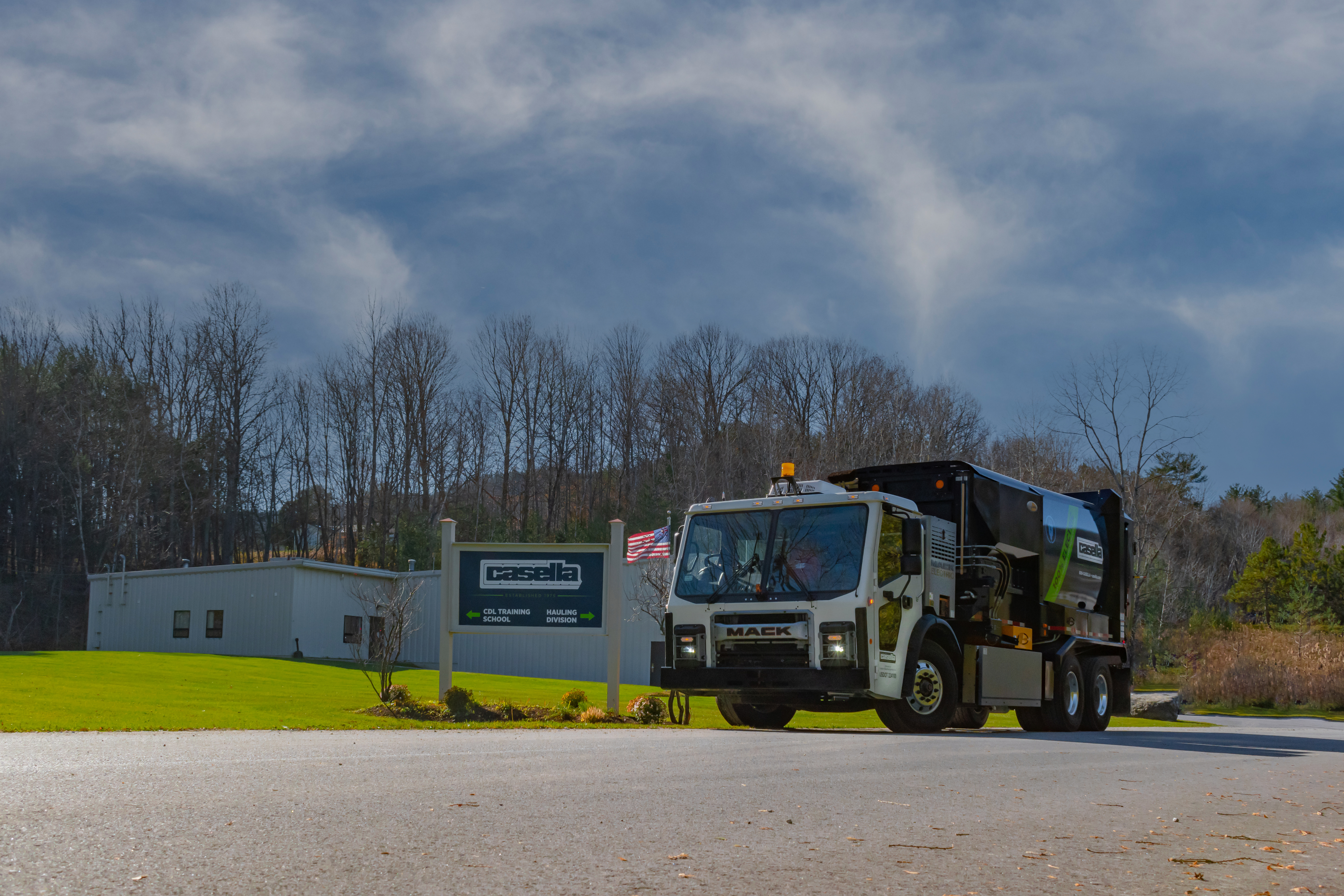 Casella's Mack LR Electric leaving the Rutland depot