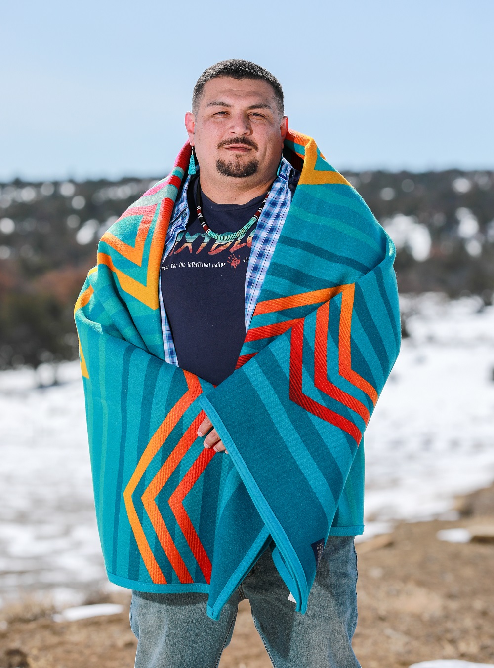 Dustin Lopez with his award-winning Pendleton Blanket Design.