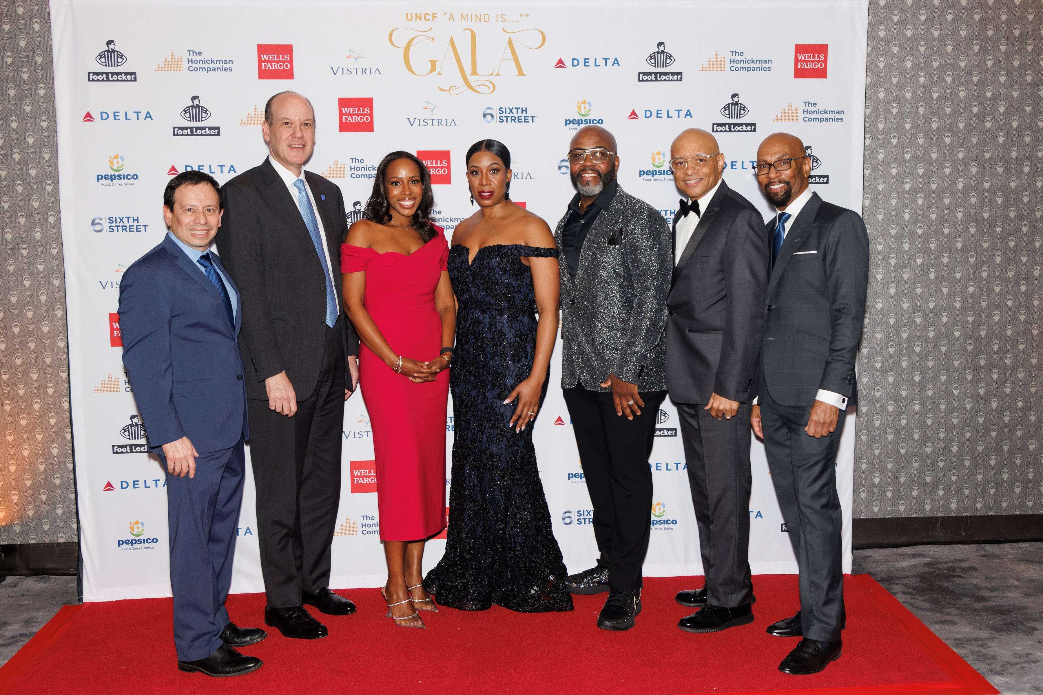 From left to right: Diego Aviles, senior vice president, northeast, UNCF; Sol Gindi, head of Wells Fargo Advisors; Margaret Anadu, co-founder & head of real estate, The Vistria Group; Tai Neal, vice president, head of community and impact, Foot Locker; George Jenkins, senior vice president of store operations and customer experience, Foot Locker; Maurice Jenkins, executive vice president & CDO, UNCF; and Warren Williams, assistant vice president, northeast, UNCF.