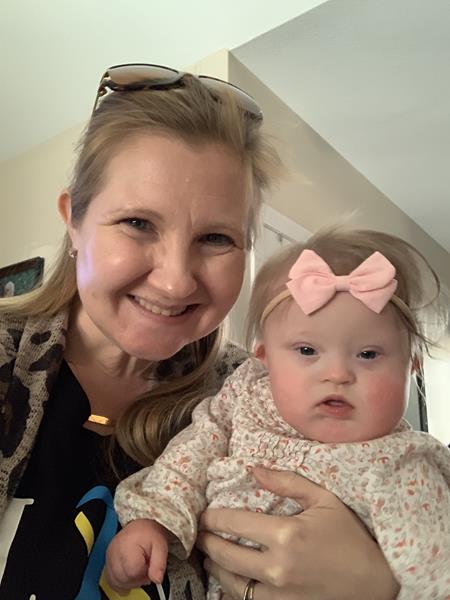 Georgia College alumna Erin Nobles with her daughter, 11-month-old Gracie, who's at the center of a new discrimination prevention law introduced to state legislators in Atlanta this week.