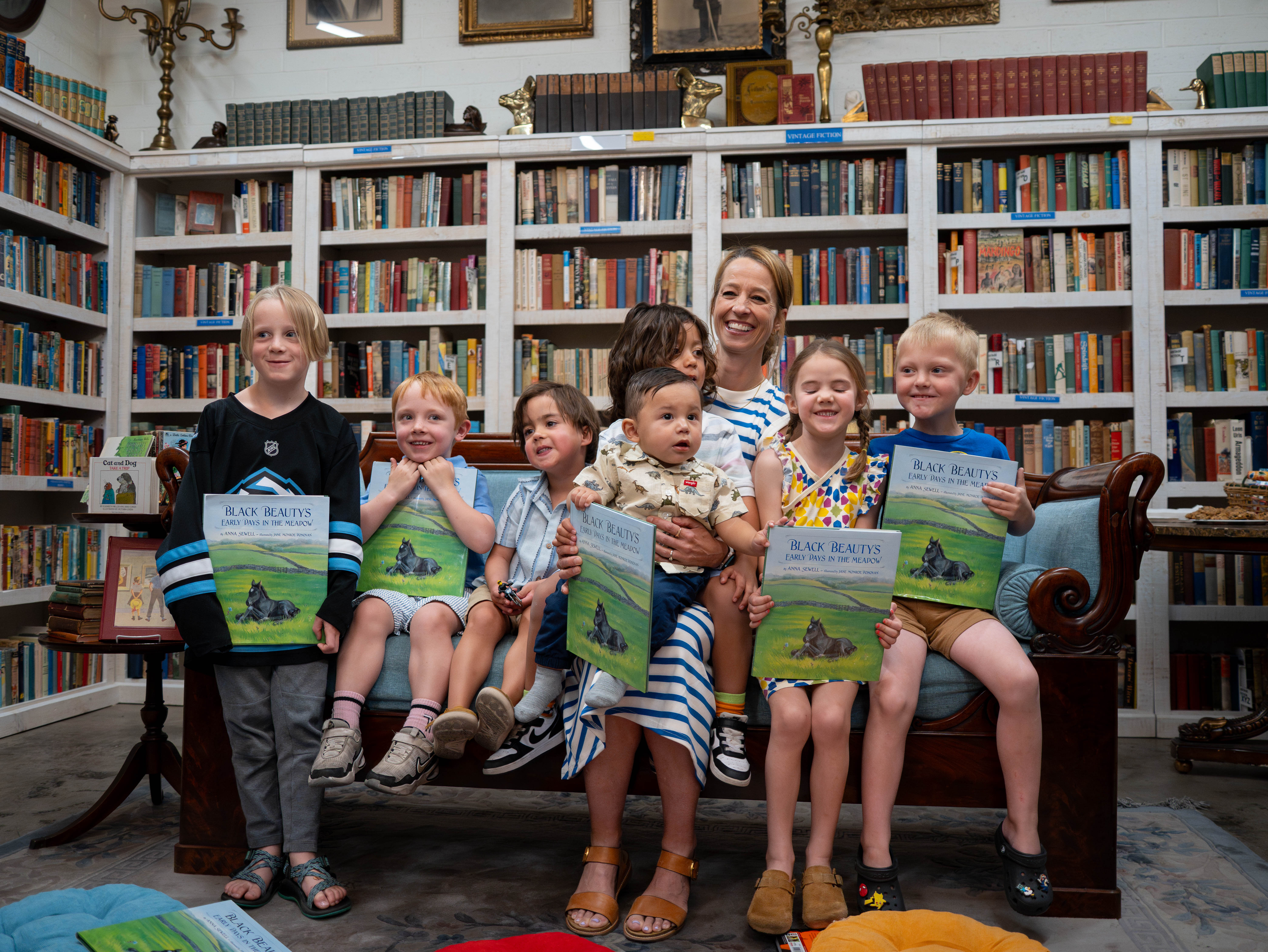 First Lady Cox, Granite Credit Union, and Marissa's Bookstore supporting Utah Read-a-thon: First Lady Cox reading to children during the Millcreek Miracle. Supporting local businesses like Marissa