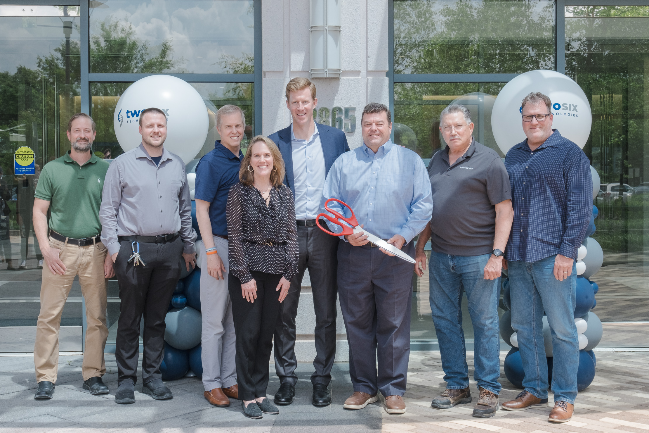 Construction team at ribbon cutting