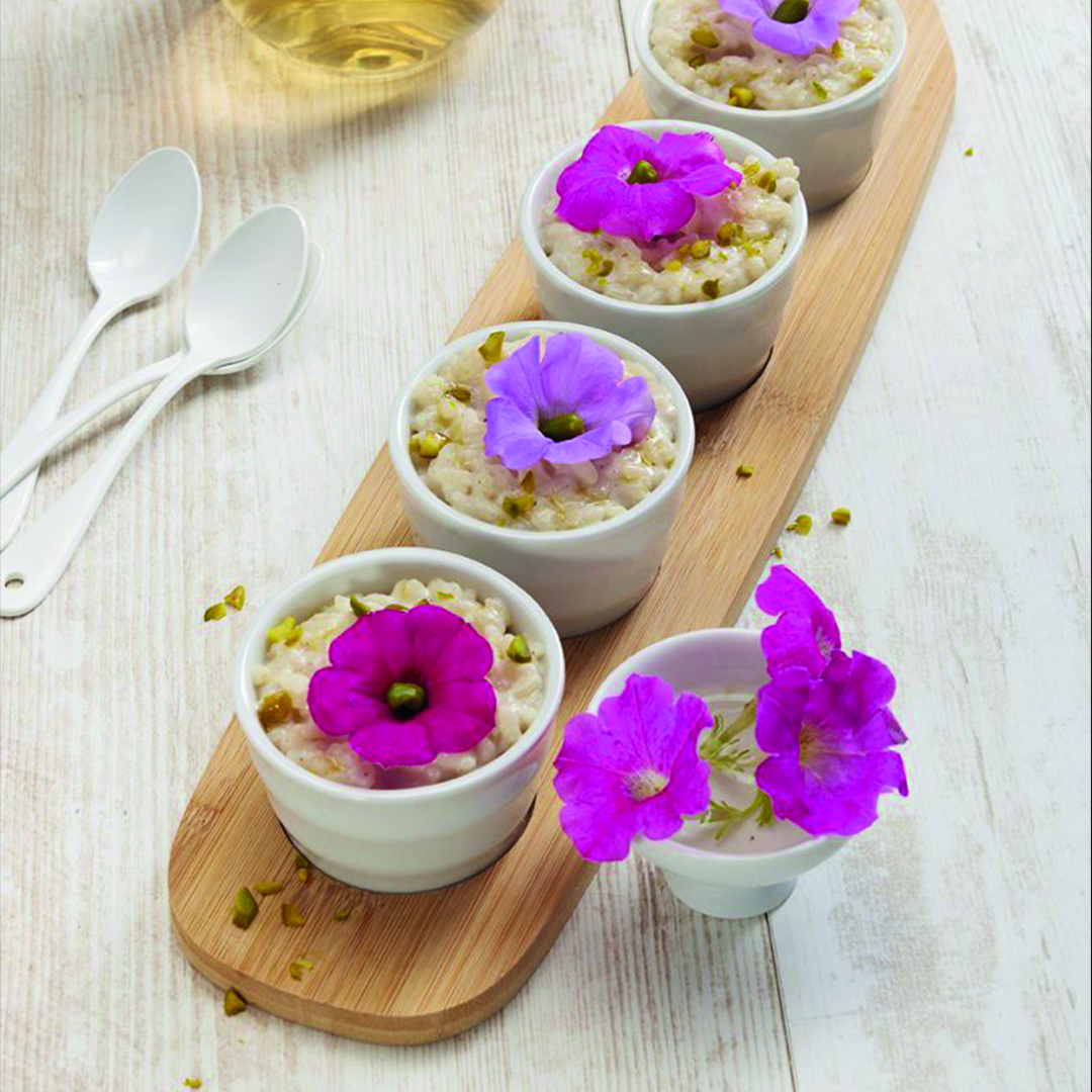 Petunias grown in the Véritable® Garden add color and beauty to this French Rice Pudding. So easy and so stunning.
