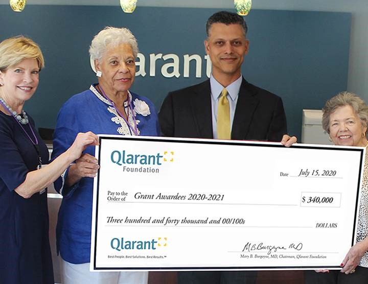 Qlarant Foundation presented $340k to sixteen non-profit organizations: (left to right) Qlarant Foundation Chair Molly Burgoyne-Brian, Qlarant Board Member Dr. Senora Simpson, Qlarant CEO Dr. Ron Forsythe, Jr., and Qlarant Foundation Secretary Brenda Crabbs.