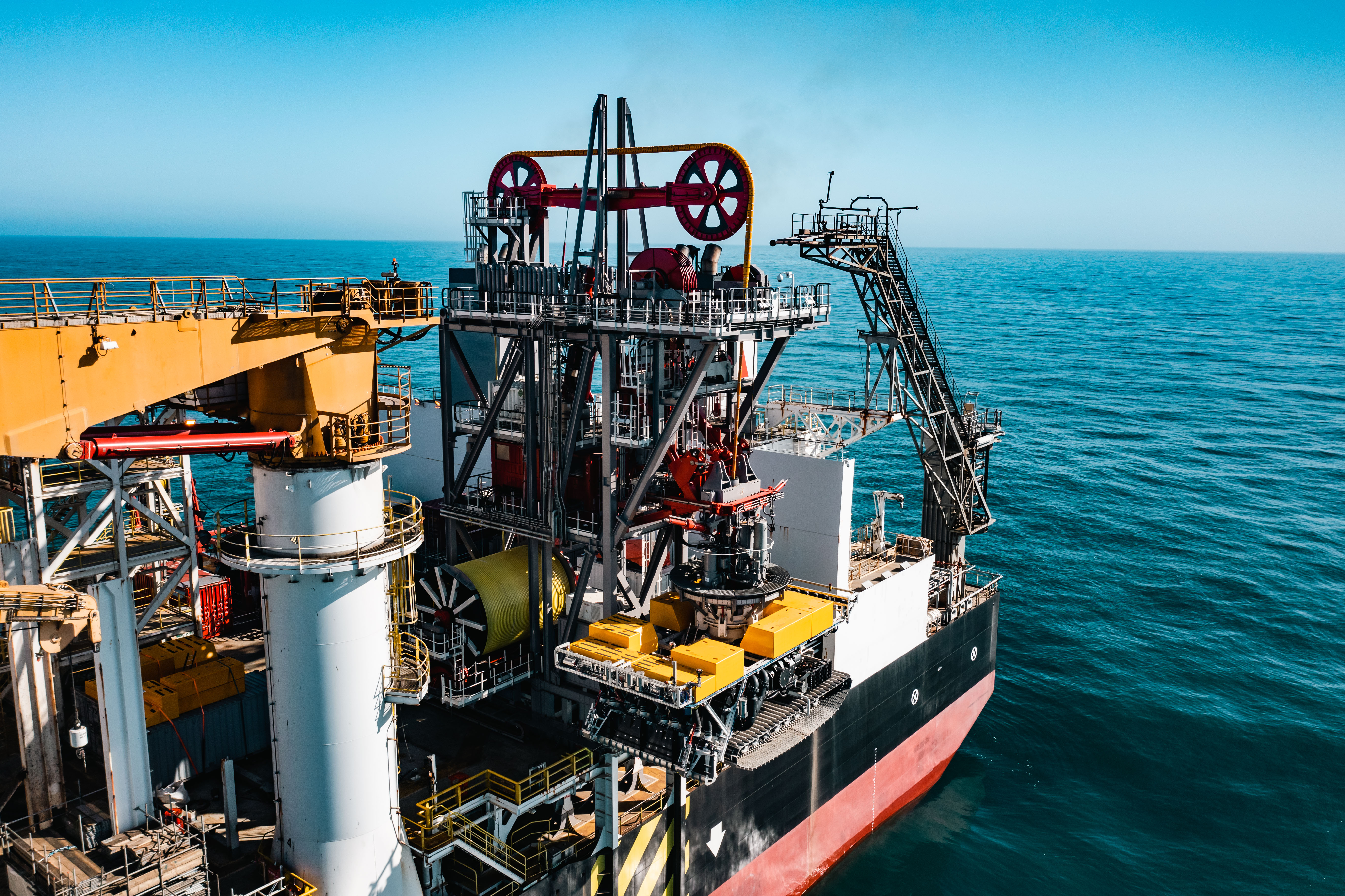 Allseas has completed concept and basic engineering of critical long-lead systems like the Launch and Recovery Systems, umbilical (both pictured) and the riser used to transport nodules to the surface.