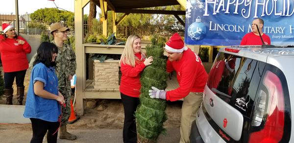 Lincoln Military Housing team members assisted residents with selecting and loading their Christmas Tree during the annual Tree Giveaway event in San Diego. 
