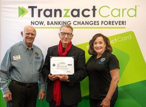 Peter Rancie accepts department of defense award - TranzactCard