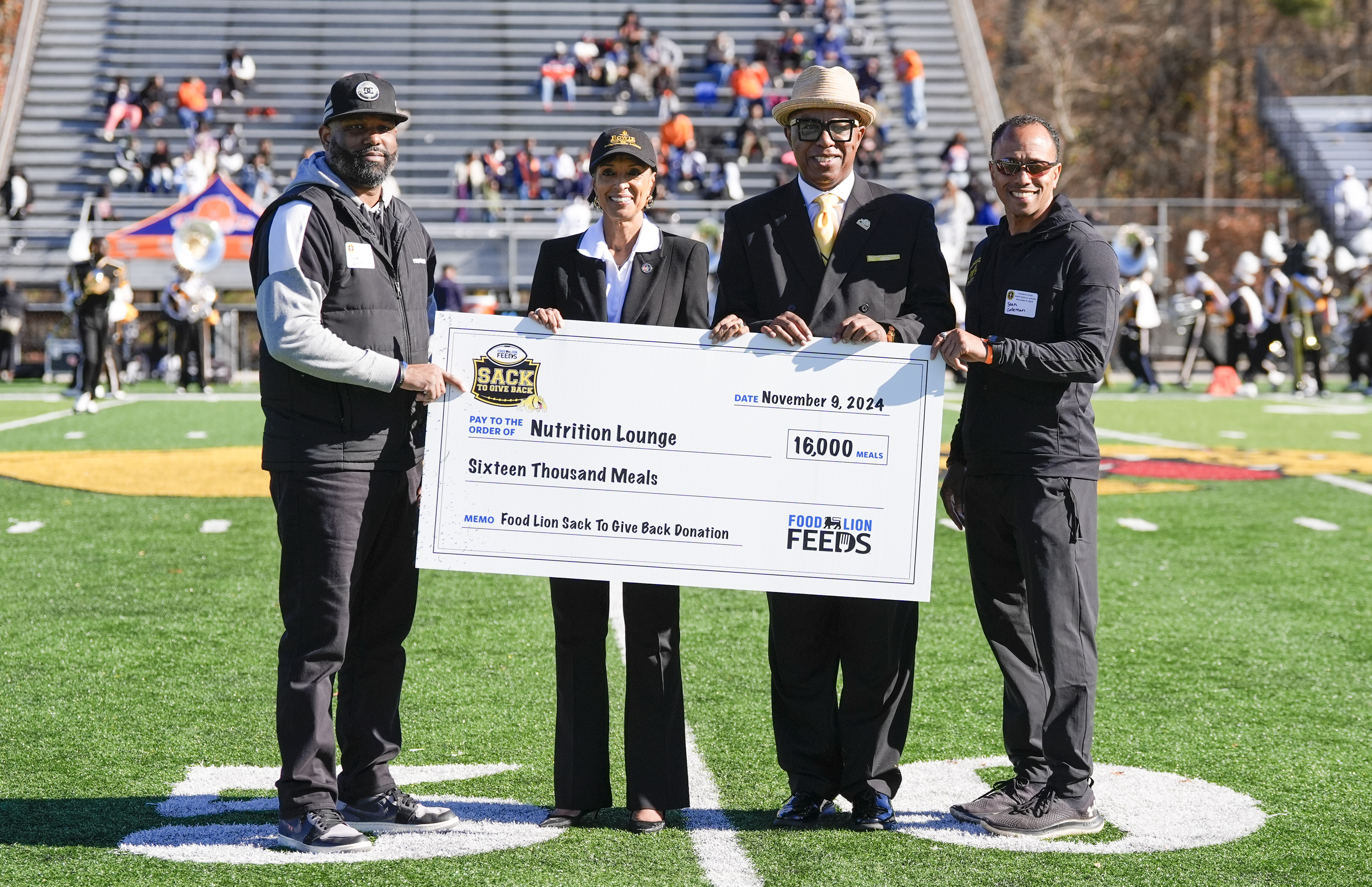 Caption: L-R: Greg Pervine, Store Manager, Food Lion; Dr. Aminta H. Breaux, President, Bowie State University; Clyde Doughty Jr., Vice President for Intercollegiate Athletics & Recreation, Bowie State University; and Dr. Sean Coleman, Faculty Athletics Representative, Bowie State UniversityThe photo of the check presentation does not represent the final results at Bowie State University; it only represents donation to date when the check presentation occurred.