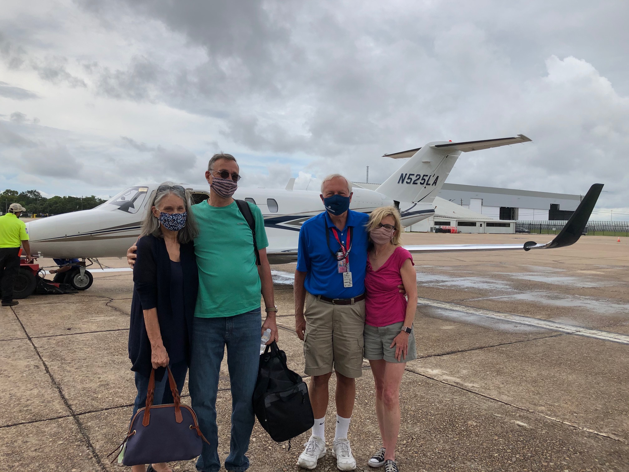 Bob Briggs with an Angel Flight family during MD Anderson trip.