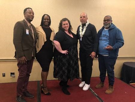 Among the featured content as the site debuts are speakers presenting the first of a series of YAPTalks. L to R: YAP Washington, DC Adult Re-entry Services Program Leader Charles Bentil; Nevada YAP Program Director Nyeri Richards; YAP New York State Regional Director Dana LaCoss; YAP (Penn North) Baltimore Safe Streets Director Dennis Wise; and YAP Chicago Choose to Change Program (partnership with Children’s Home and Aid and the University of Chicago Crime Lab) Director Chris Sutton