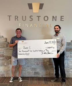 Left to Right: Owen L., top scholarship recipient winner; Chase Dronen, AVP, Branch Manager at the TruStone Financial Rogers branch.