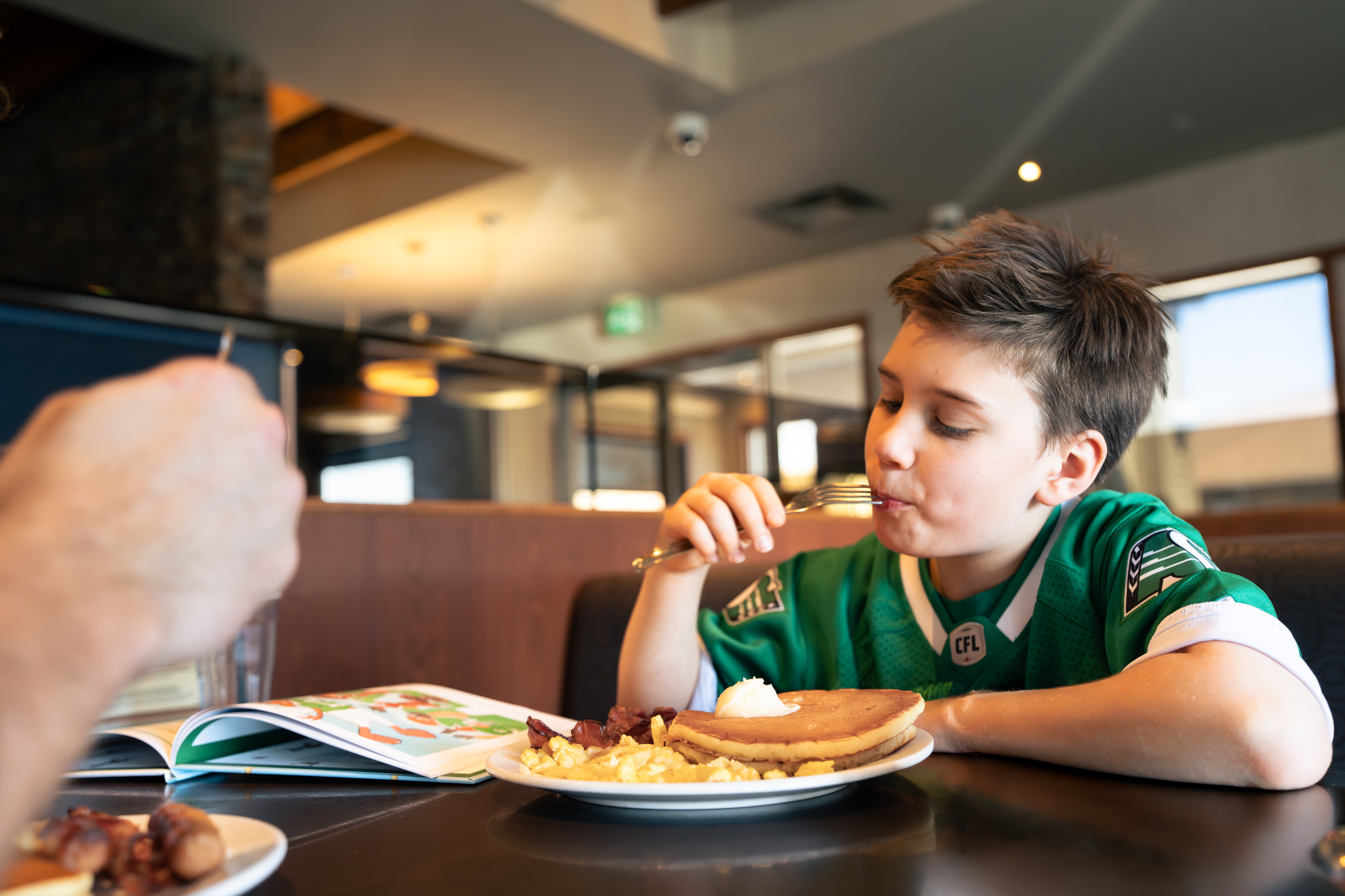Denny’s Canada and Saskatchewan Roughrider Foundation kid enjoys grand slam