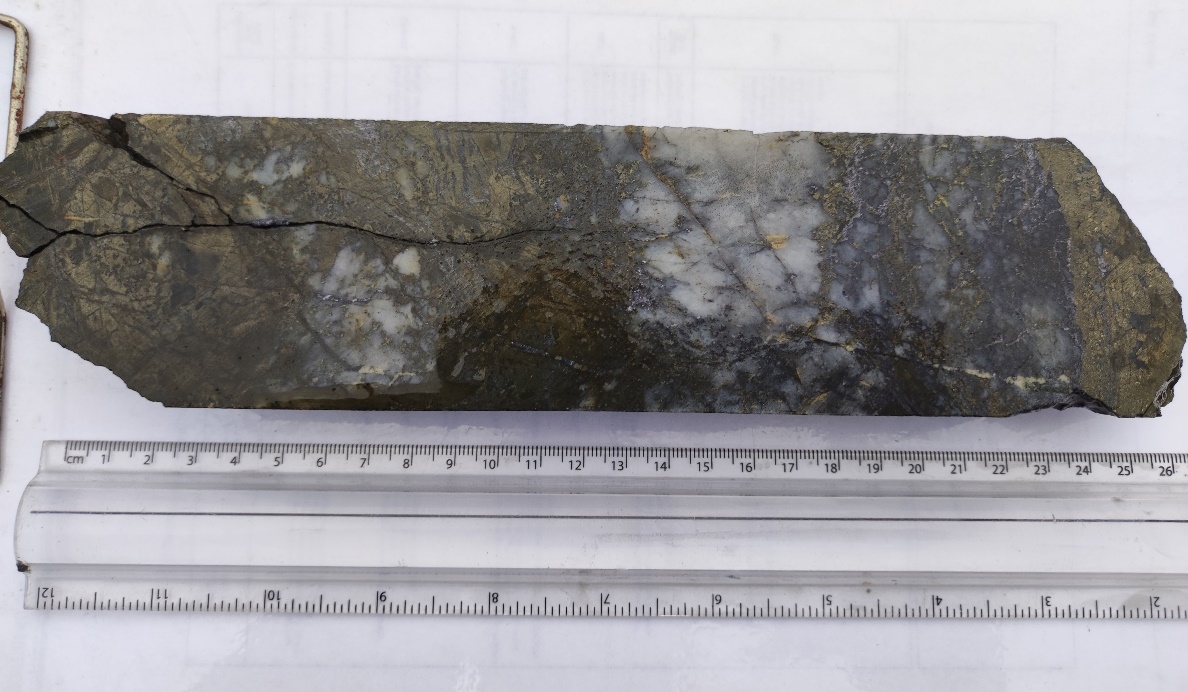 Part of a split section of drill core from hole FR-DD-22-UG-192 grading 42.8 g/t Au and 432 g/t Ag over a core length of 0.36 metres.