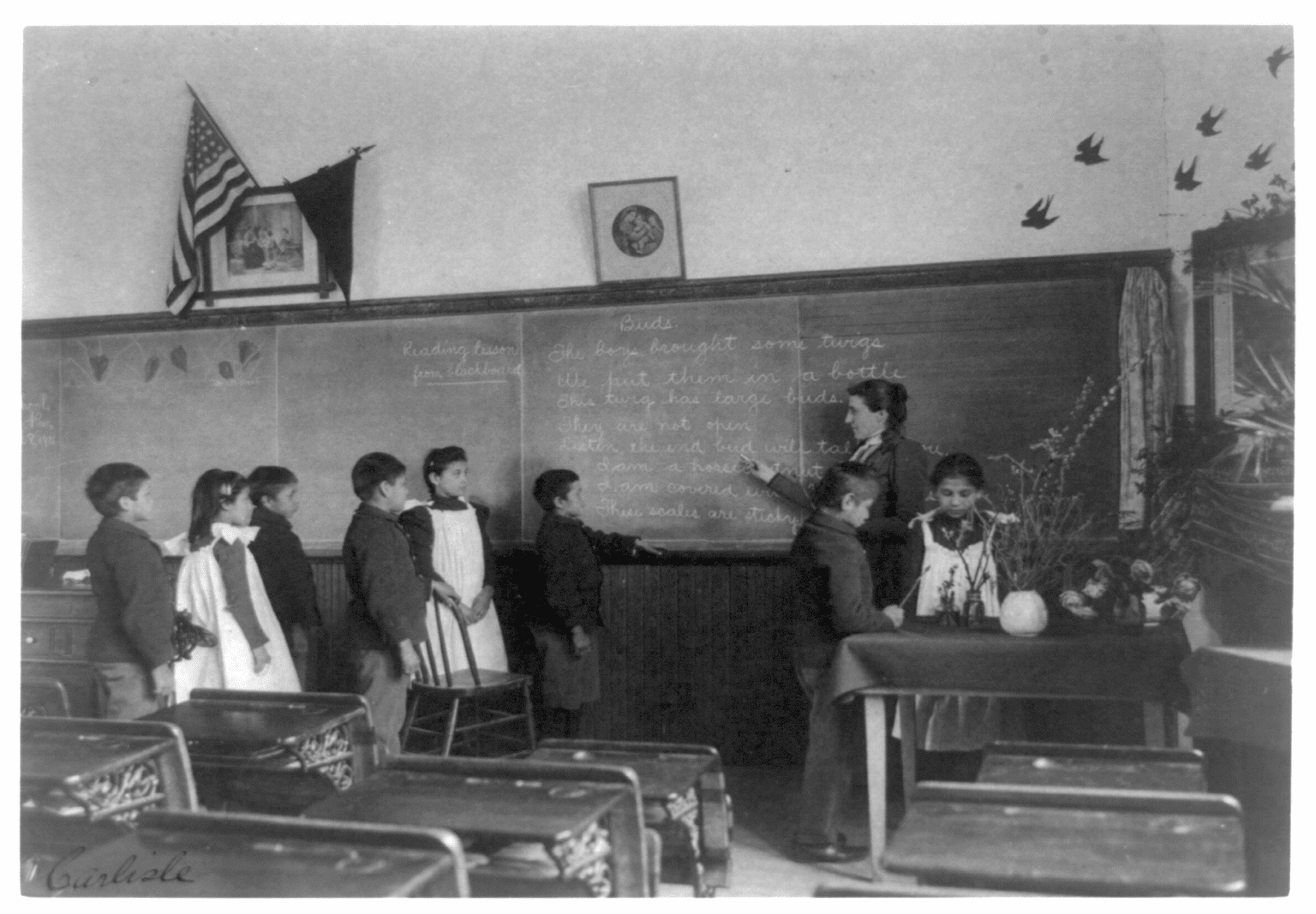 Historical photo of Native children attending a boarding school