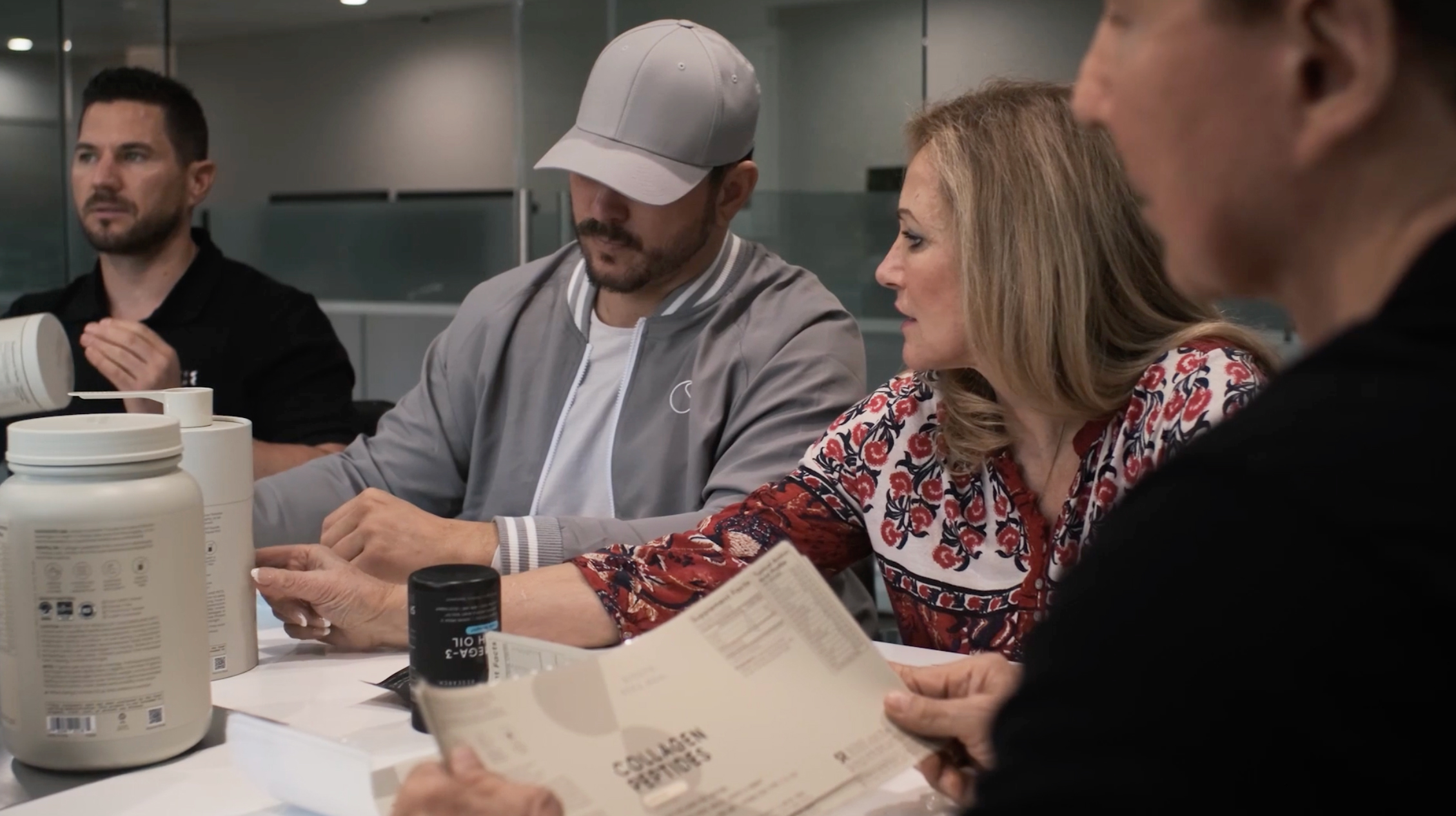 Pedersen family sits around table to review in-depth redesign of the old packaging, including a new color palette,