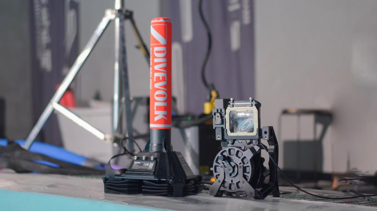 The SeaLink surface buoy and underwater terminal stand ready on the pool deck