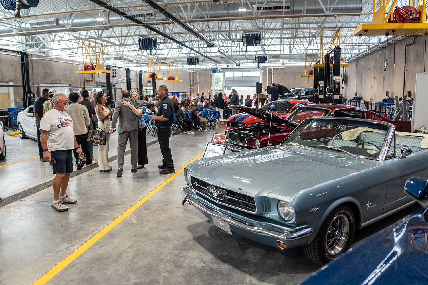 Attendees admire and celebrate the grand opening of the Transportation Systems Technology Center at RioTECH.