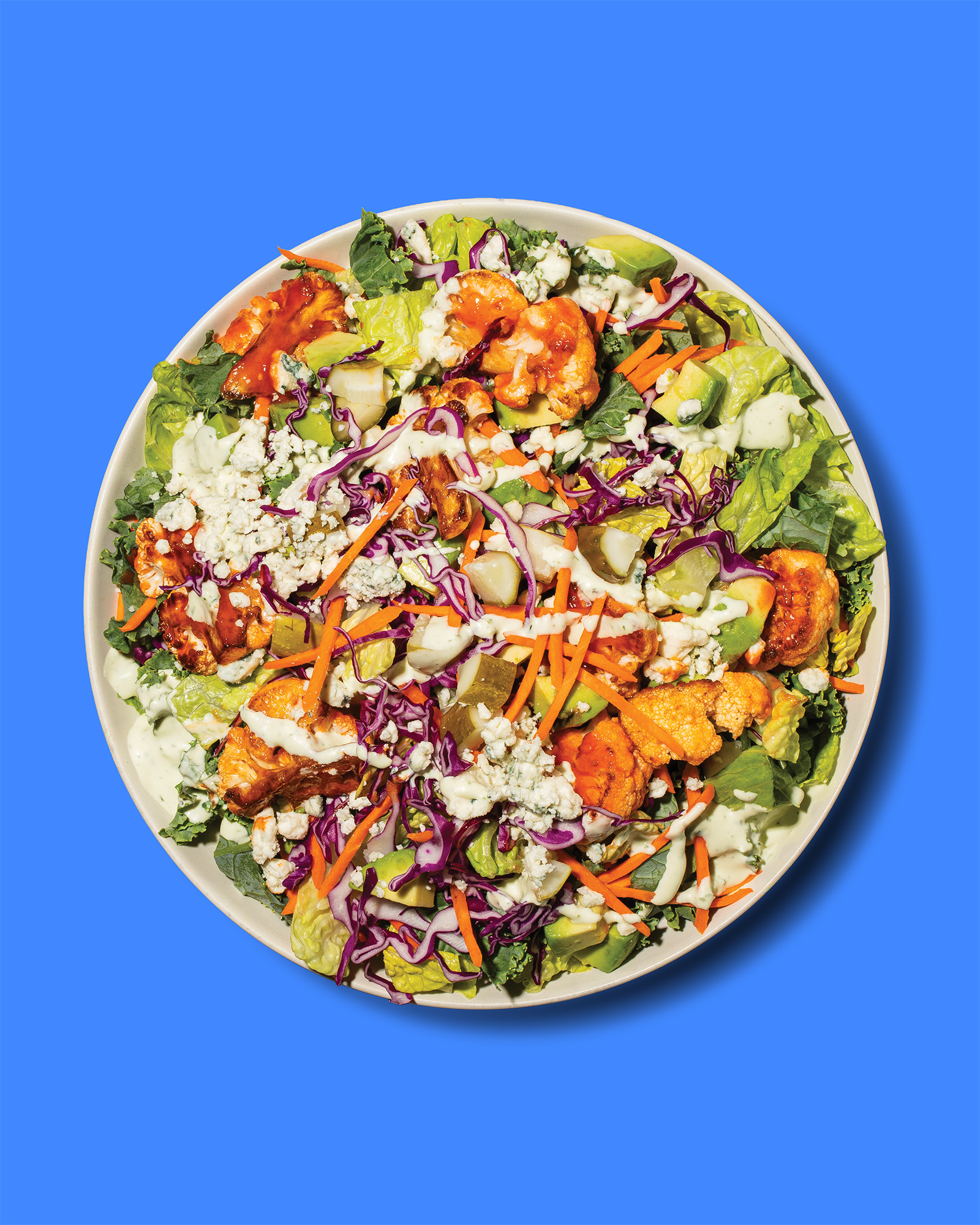Just Salad’s returning Buffalo Cauliflower Salad combines romaine, kale and red cabbage with roasted Buffalo cauliflower, carrots, avocado, Grillo’s Pickles and blue cheese, served with Homemade Buttermilk Ranch.