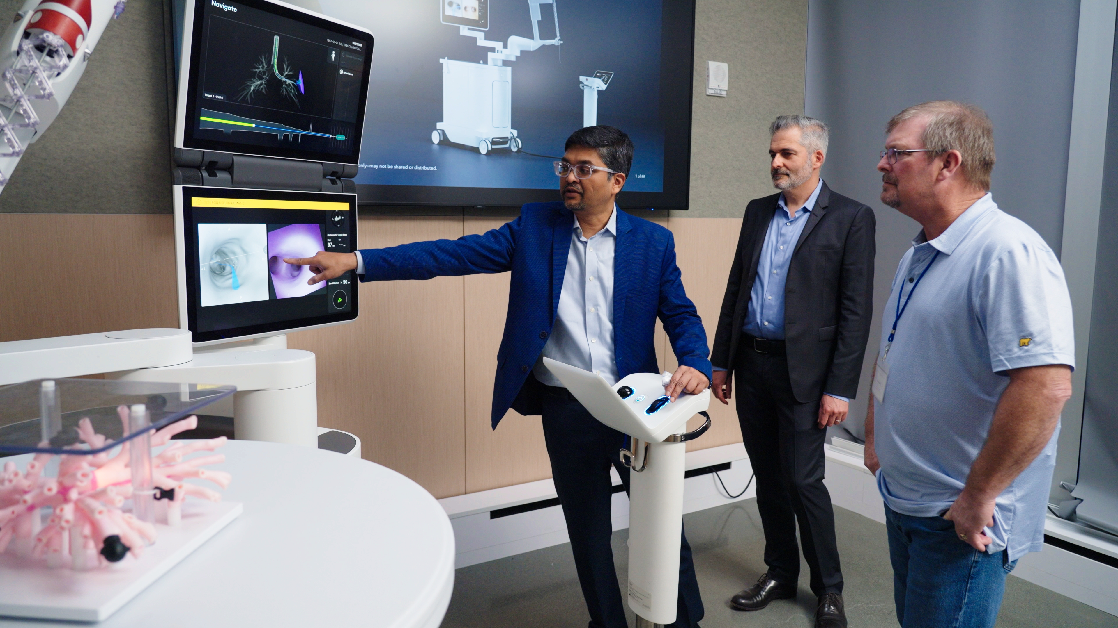 Dr. Biswas, one of Dan's physicians, explains to patient Dan Larson and to Federico Barbagli of Intuitive, how he was able to use Intuitive's Ion Endoluminal System to support the biopsy of Dan's cancer.