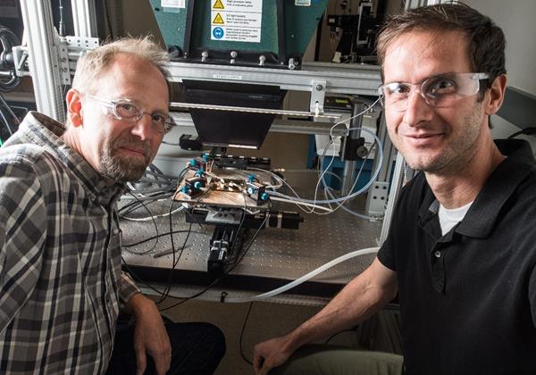 Scientists Ryan France (left) and John Geisz fabricated a solar cell that is nearly 50% efficient.