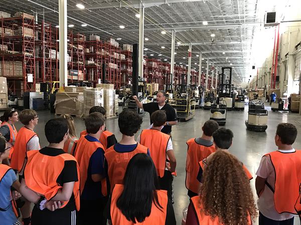 Students from Davie County School District (North Carolina) hear from Ashley leaders on different processes and careers in the Distribution Center.