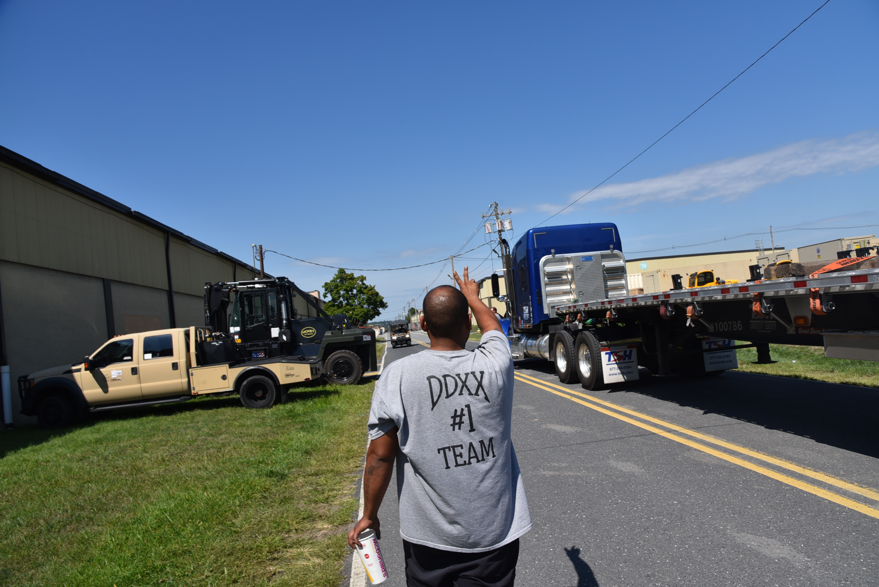 Members of the Defense Logistics Agency Distribution Expeditionary team mobilize for duty at Maxwell Air Force Base, Montgomery, Alabama, Aug. 28. The mission for the DDXX team is to support the Federal Emergency Management Agency by establishing an Incident Support Base. From that base, supplies are tracked as they come in and as they are distributed when needed.  Here members of the team load prepackaged equipment on nine different trucks that will arrive to meet the 21 deployed members as they begin work establishing the base. Photo by DLA Public Affairs 