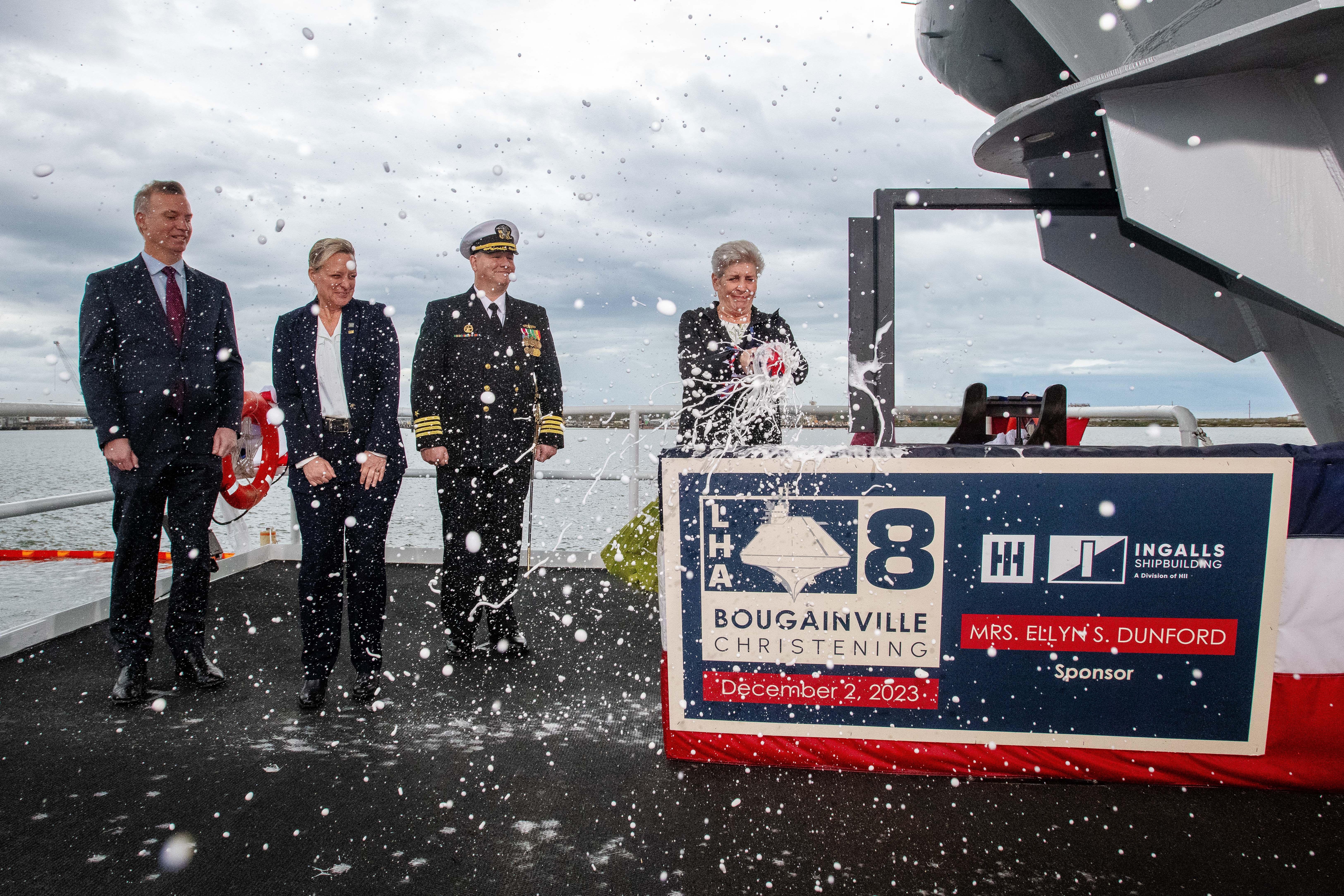 Ship’s sponsor Ellyn S. Dunford christened the Bougainville (LHA 8) at HII’s Ingalls Shipbuilding. Pictured from left is Under Secretary of the Navy Erik Raven, Ingalls Shipbuilding President Kari Wilkinson, Prospective Commanding Officer, Bougainville (LHA 8) Capt. Harry Marsh, U.S. Navy, and Ship’s Sponsor Ellyn S. Dunford.