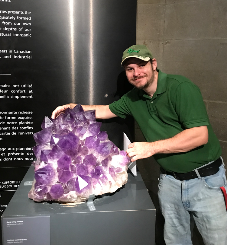 Keith poses with one of the exhibits during his visit to the Royal Ontario Museum