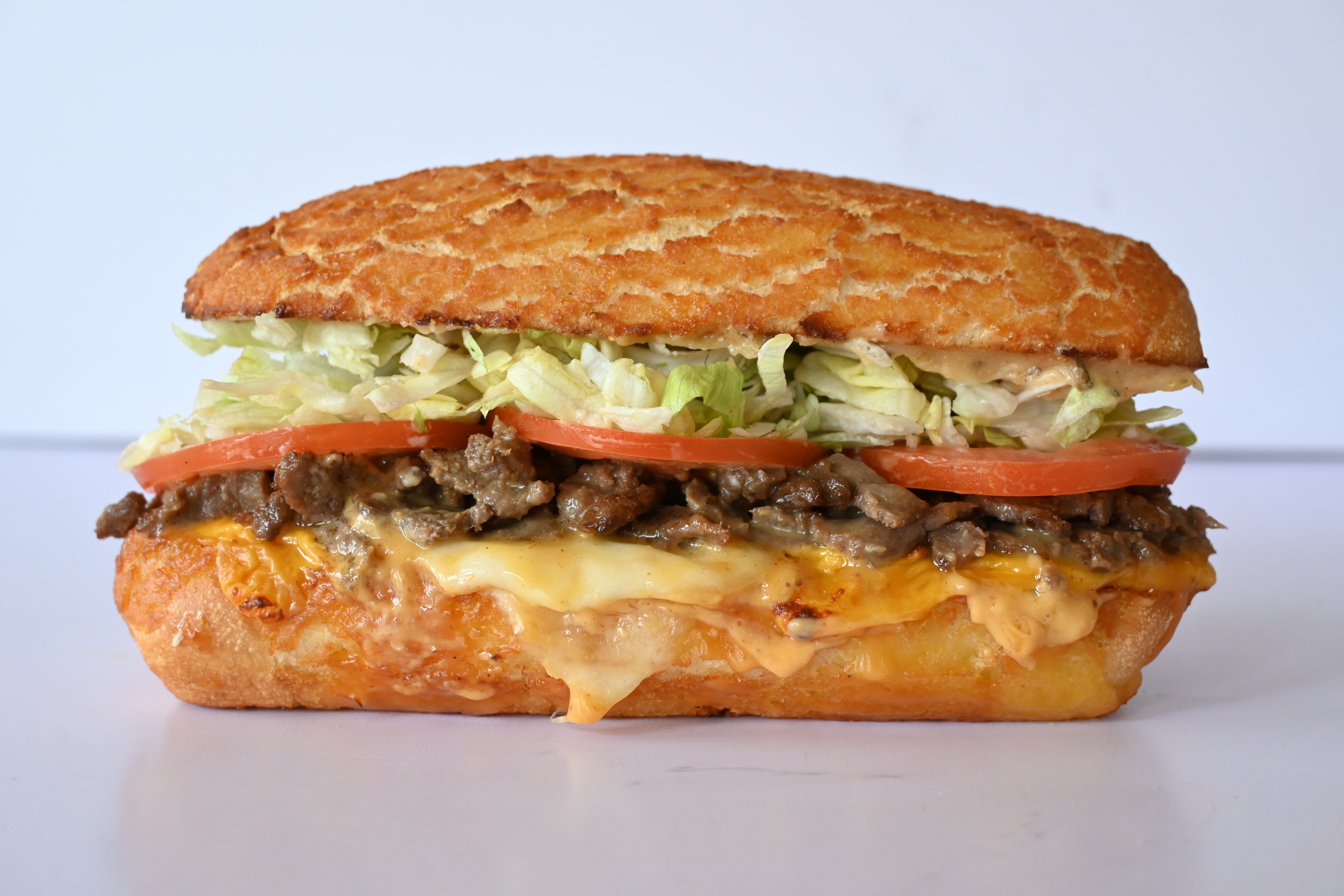 Co-created by Denver football phenom Ja'Quan McMillian, The J Mac has a beefy lineup of Steak, Godfather Sauce, Dirty Dressing, American cheese, and Provolone.