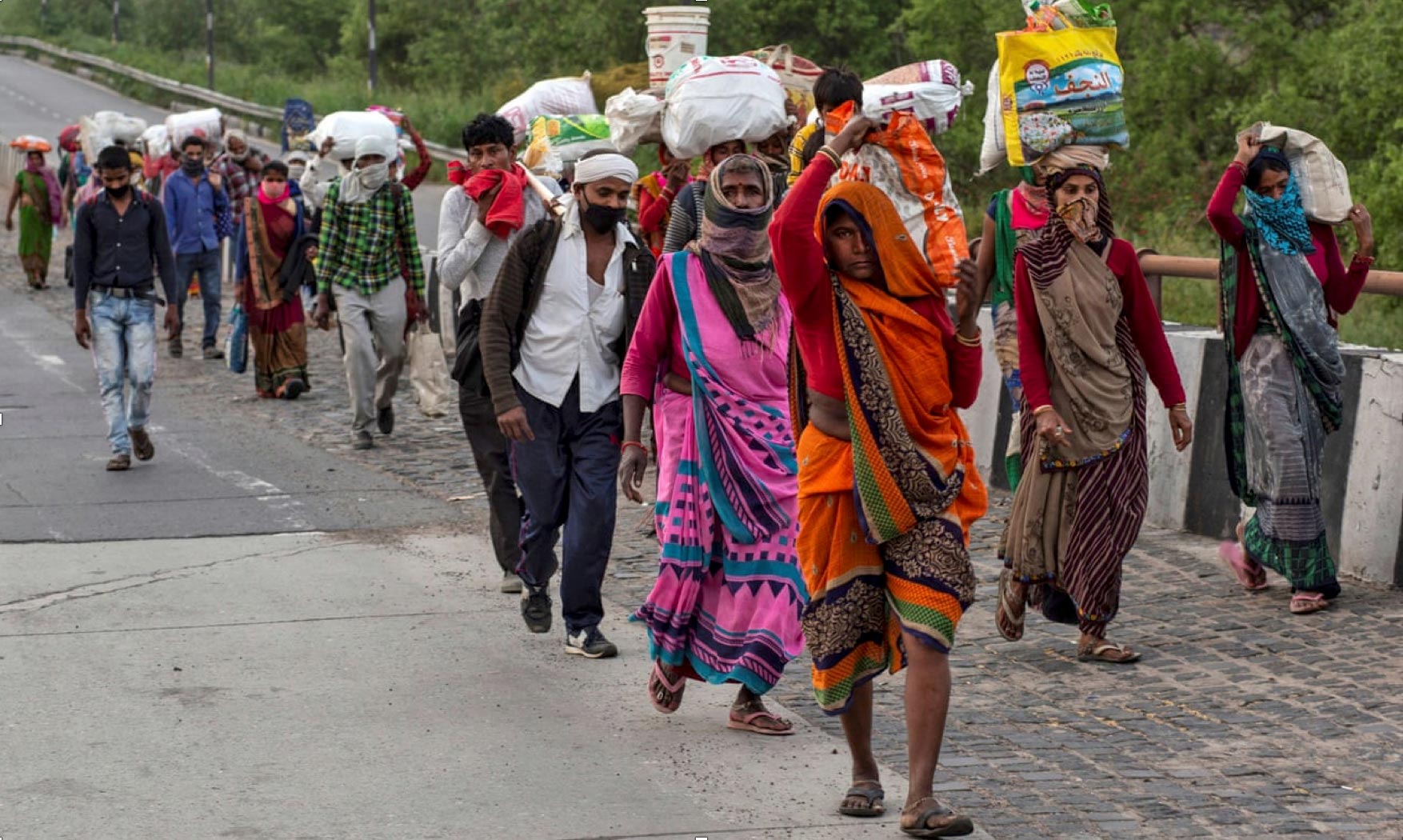 Due to coronavirus, millions of workers flee cities as wages evaporate, with many walking hundreds of miles home